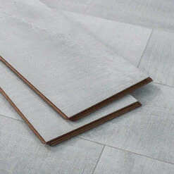 BuildDirect Pristine White 12mm 72" X 7.7" Laminate Flooring (23.09sq. Ft. Per Box) -Hardware Store 9fe9da7d ac31 4ed6 855c f3282e030052 1.b5233ec37d3383882f2e82849e4873da 1800x1800